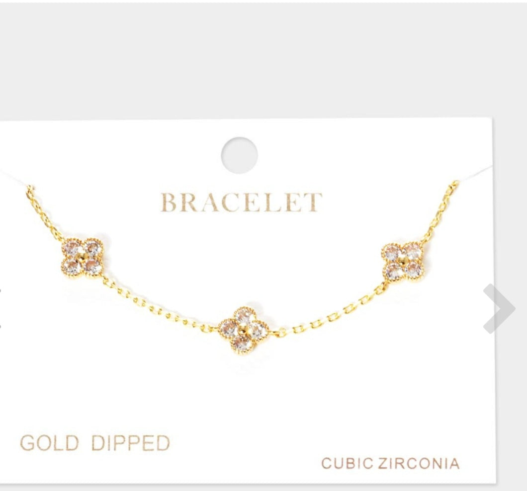 Color

￼

Gold Dipped CZ Triple Quatrefoil Charm Station Bracelet